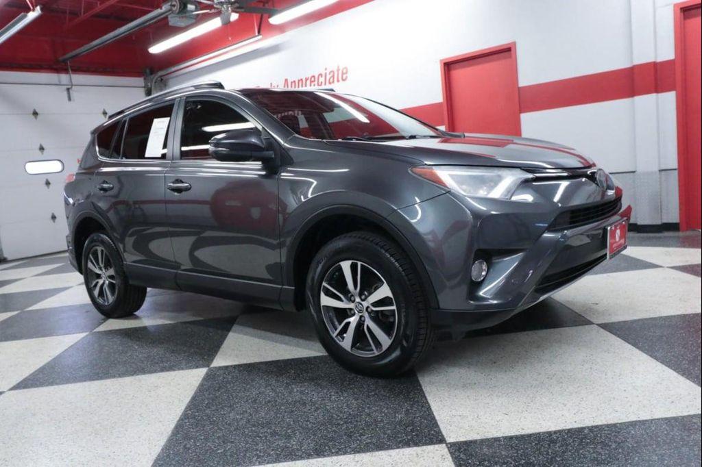 used 2018 Toyota RAV4 car, priced at $19,990