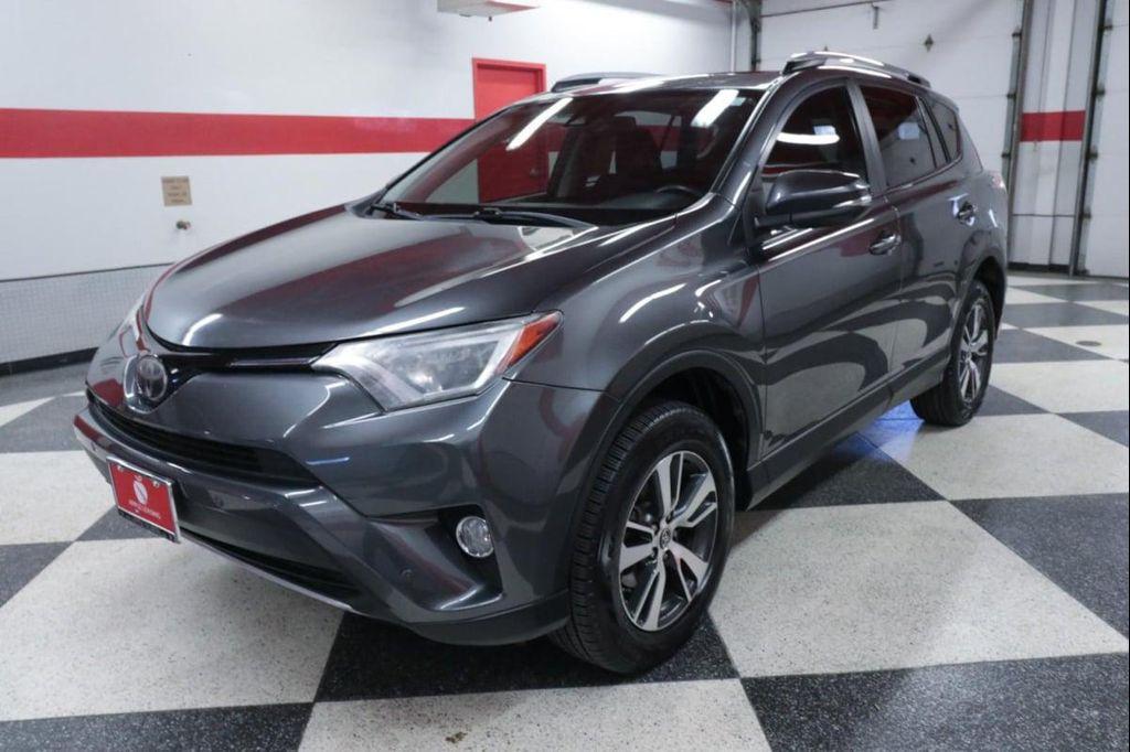 used 2018 Toyota RAV4 car, priced at $19,990
