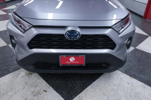 used 2021 Toyota RAV4 Hybrid car, priced at $29,990