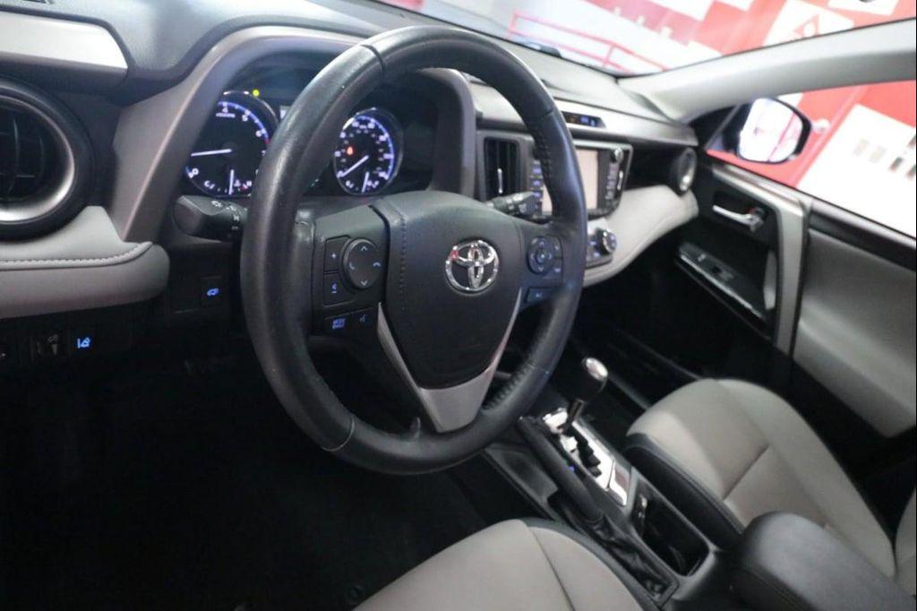 used 2018 Toyota RAV4 car, priced at $21,990