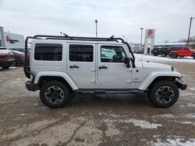 used 2011 Jeep Wrangler Unlimited car, priced at $15,988