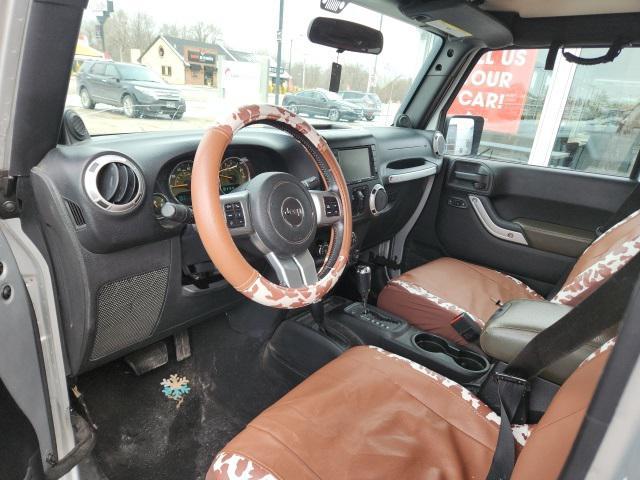 used 2011 Jeep Wrangler Unlimited car, priced at $15,988