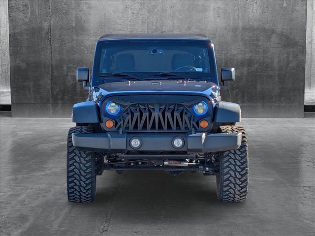 used 2013 Jeep Wrangler Unlimited car, priced at $15,495