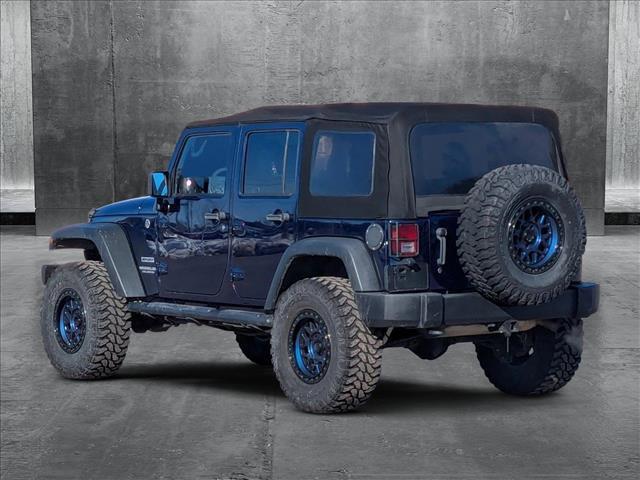 used 2013 Jeep Wrangler Unlimited car, priced at $15,495