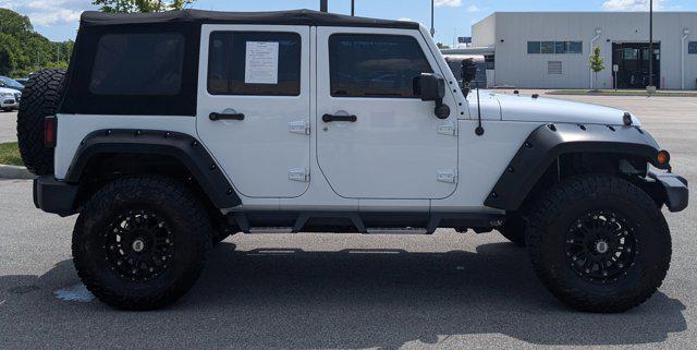 used 2016 Jeep Wrangler Unlimited car, priced at $21,550