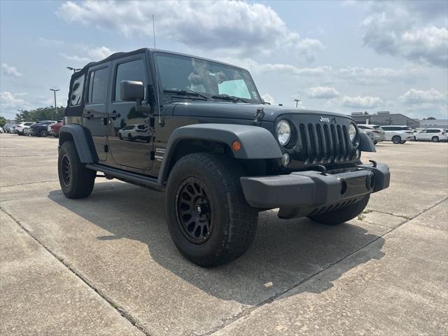 used 2015 Jeep Wrangler Unlimited car, priced at $16,991