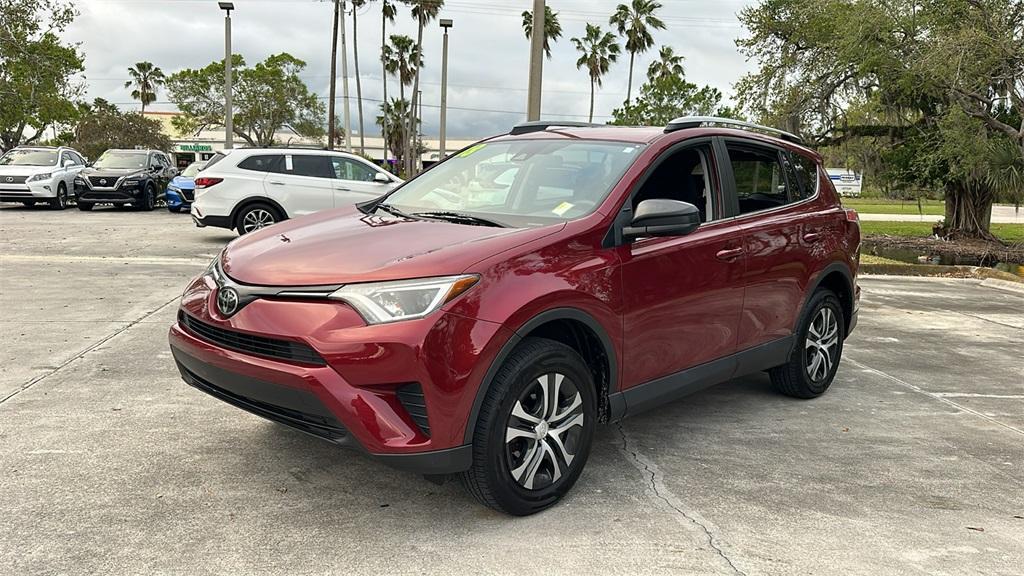 used 2018 Toyota RAV4 car, priced at $15,000