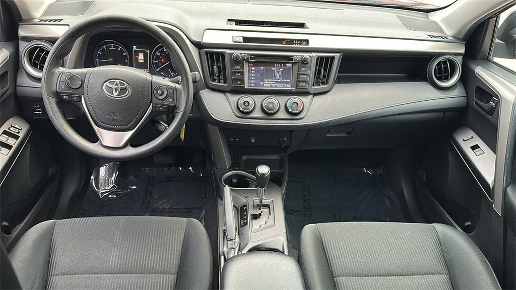 used 2018 Toyota RAV4 car, priced at $15,000