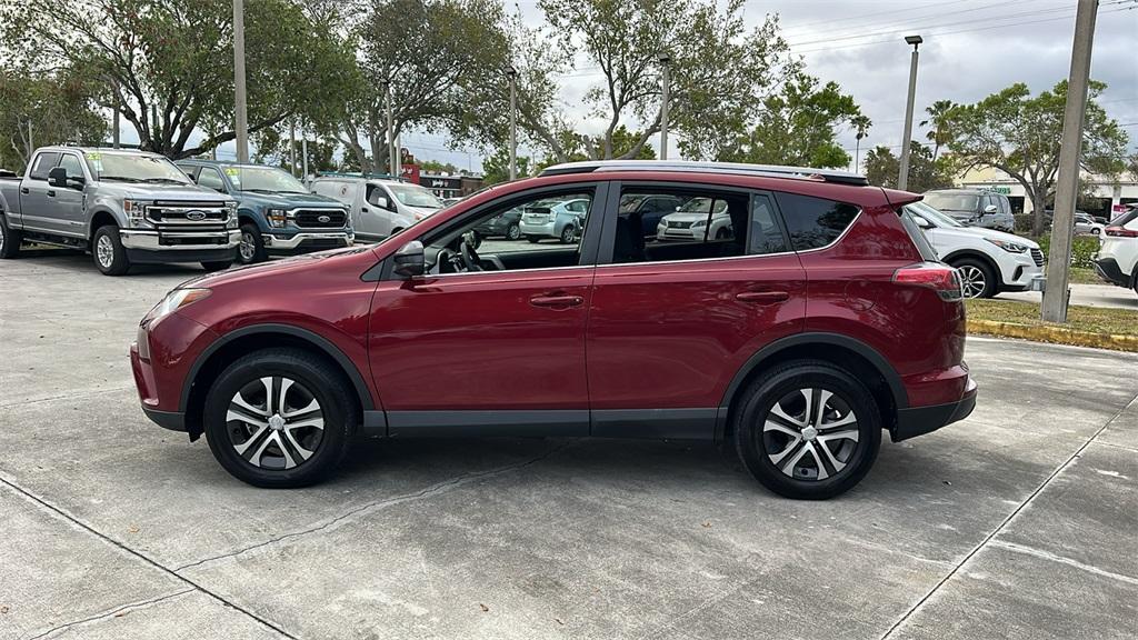 used 2018 Toyota RAV4 car, priced at $15,000