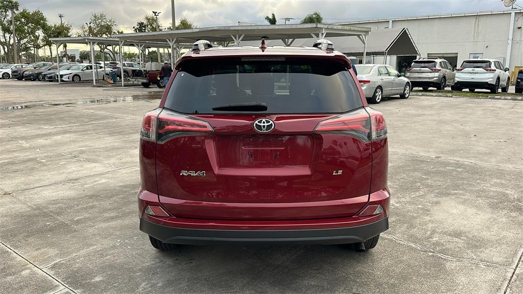 used 2018 Toyota RAV4 car, priced at $15,000