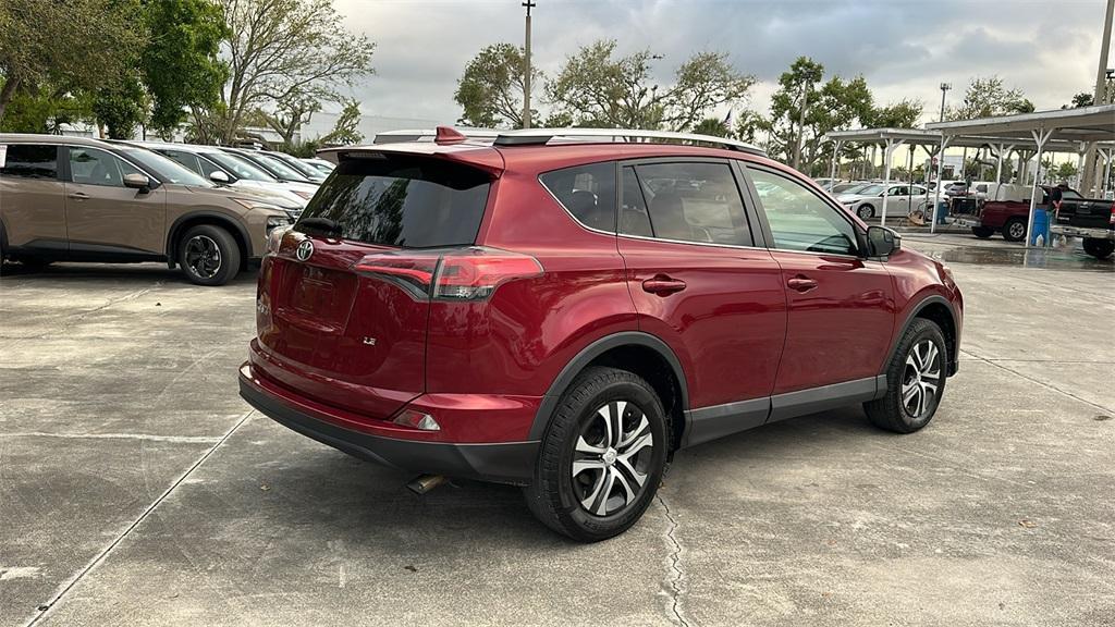 used 2018 Toyota RAV4 car, priced at $15,000