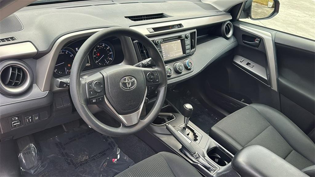 used 2018 Toyota RAV4 car, priced at $15,000