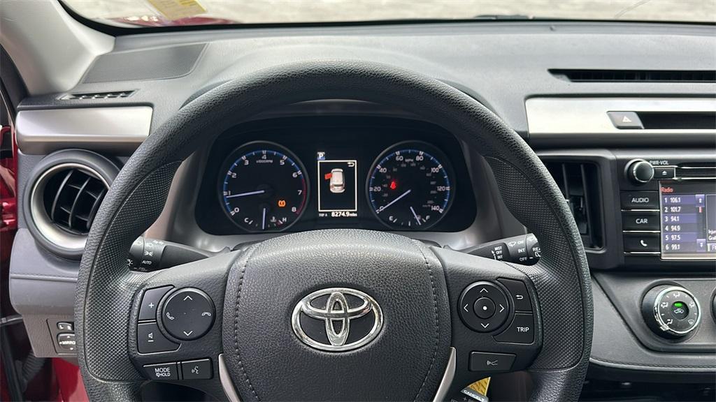 used 2018 Toyota RAV4 car, priced at $15,000