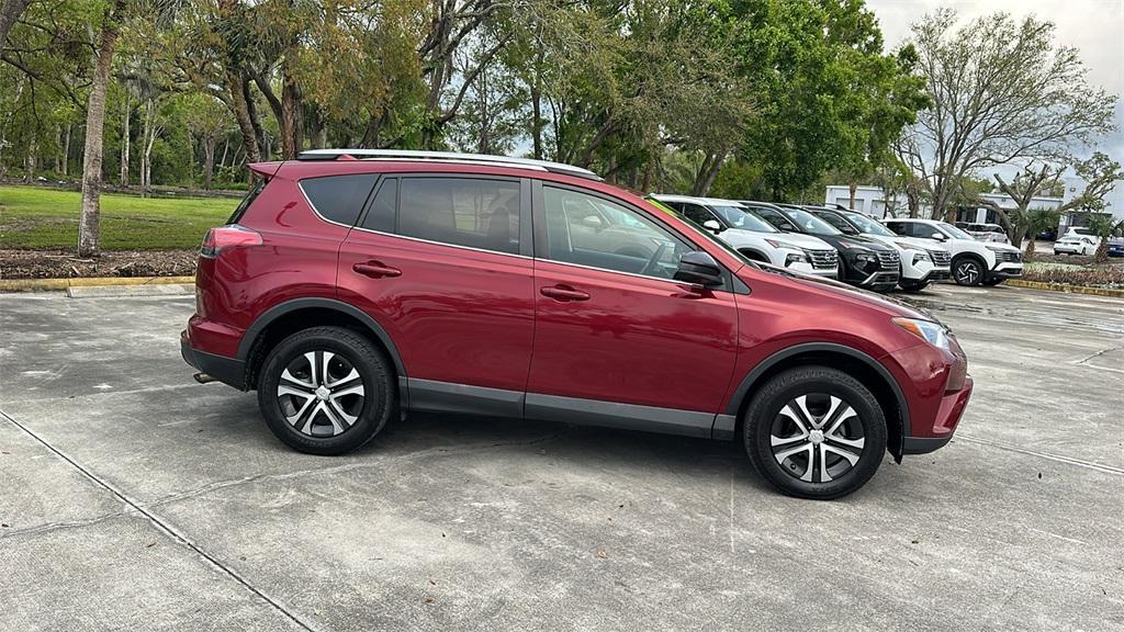 used 2018 Toyota RAV4 car, priced at $15,000