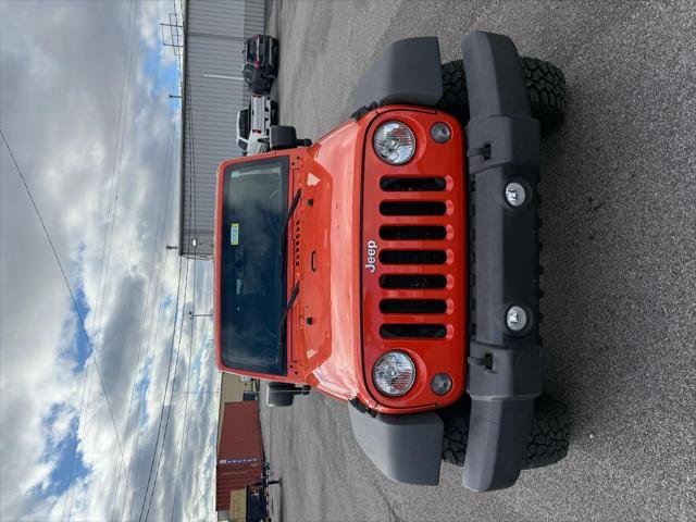 used 2015 Jeep Wrangler Unlimited car, priced at $21,998