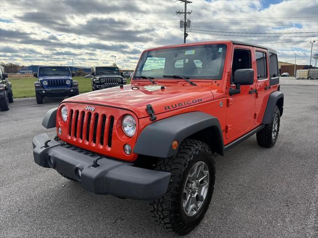 used 2015 Jeep Wrangler Unlimited car, priced at $21,998