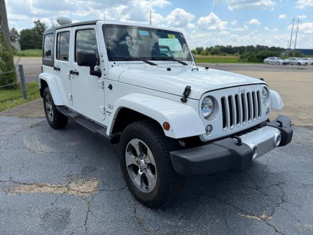 used 2018 Jeep Wrangler JK Unlimited car, priced at $20,998