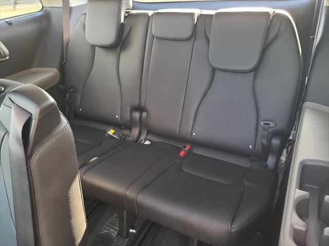 new 2025 Kia Carnival Hybrid car, priced at $49,250