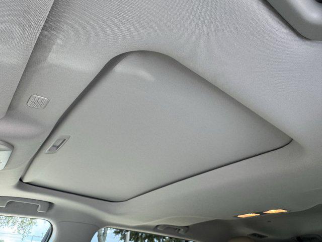 used 2021 Toyota Highlander Hybrid car, priced at $35,895