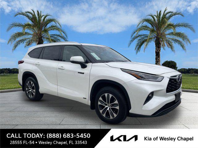 used 2021 Toyota Highlander Hybrid car, priced at $33,593