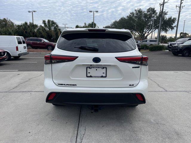 used 2021 Toyota Highlander Hybrid car, priced at $33,593