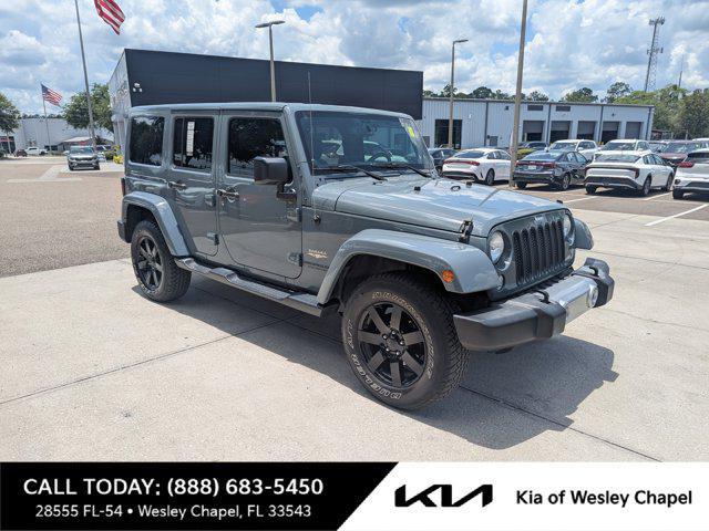 used 2014 Jeep Wrangler Unlimited car, priced at $21,997