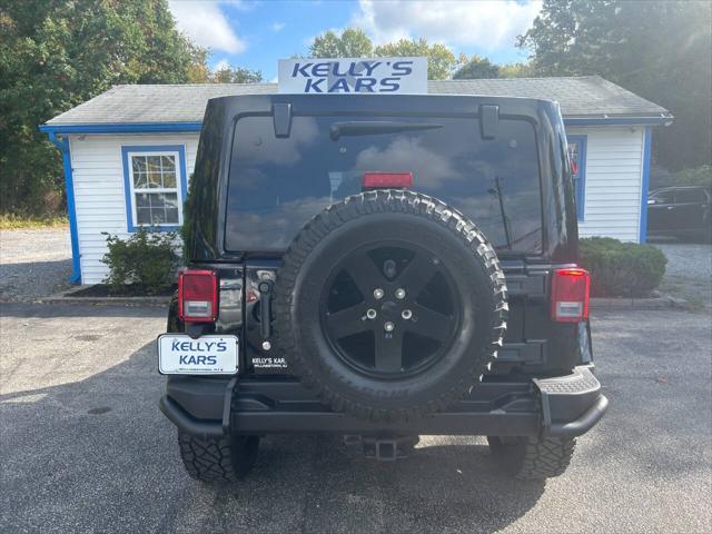 used 2012 Jeep Wrangler Unlimited car, priced at $13,995