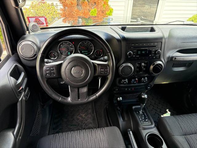 used 2012 Jeep Wrangler Unlimited car, priced at $17,995