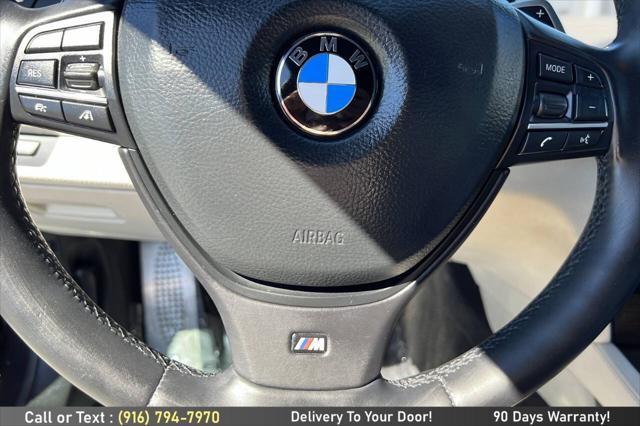 used 2014 BMW 750 car, priced at $14,499