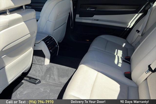 used 2014 BMW 750 car, priced at $14,499