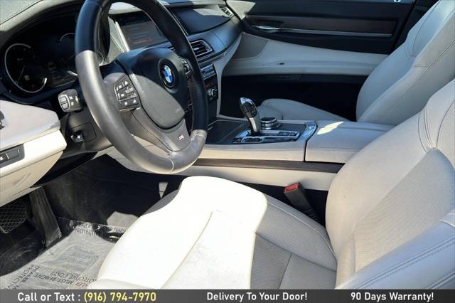 used 2014 BMW 750 car, priced at $14,499