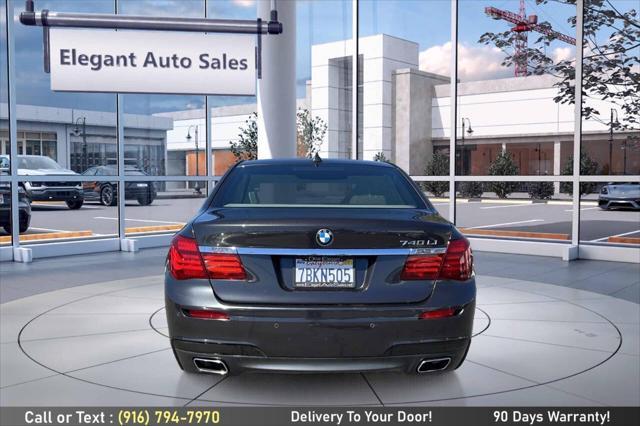 used 2014 BMW 750 car, priced at $14,499