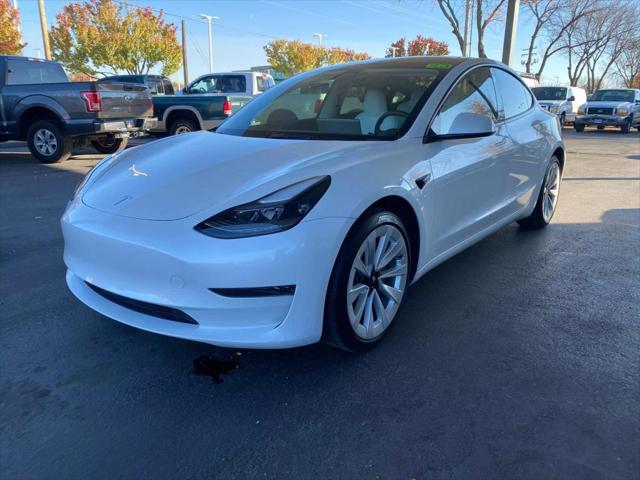 used 2023 Tesla Model 3 car, priced at $29,995