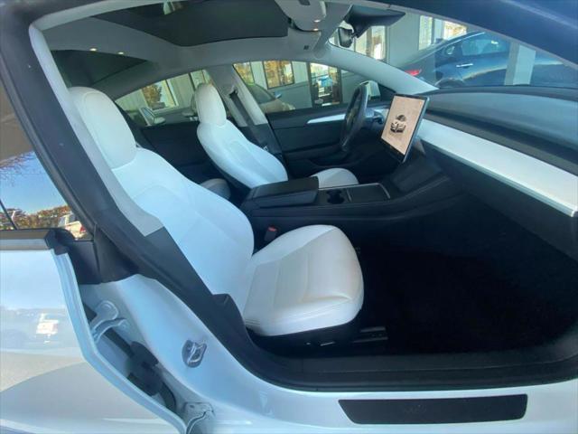 used 2023 Tesla Model 3 car, priced at $29,995