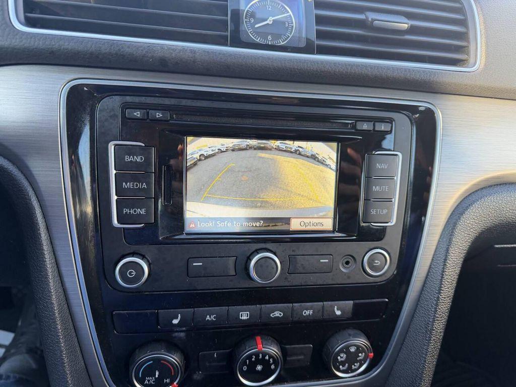 used 2014 Volkswagen Passat car, priced at $8,999