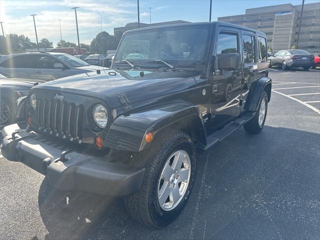 used 2012 Jeep Wrangler Unlimited car, priced at $14,000