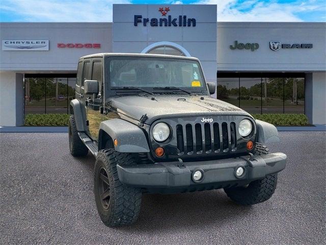 used 2013 Jeep Wrangler Unlimited car, priced at $16,990