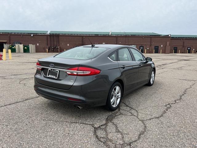 used 2018 Ford Fusion car, priced at $11,979