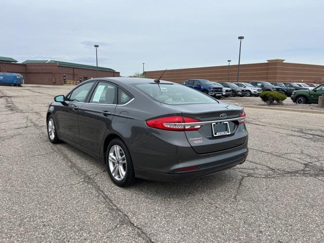 used 2018 Ford Fusion car, priced at $12,592