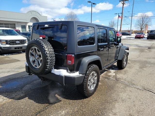 used 2013 Jeep Wrangler Unlimited car, priced at $17,810