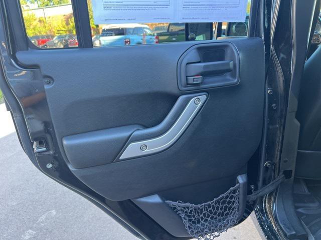 used 2013 Jeep Wrangler Unlimited car, priced at $16,574