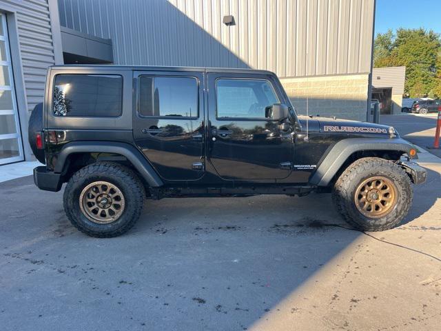 used 2013 Jeep Wrangler Unlimited car, priced at $16,574