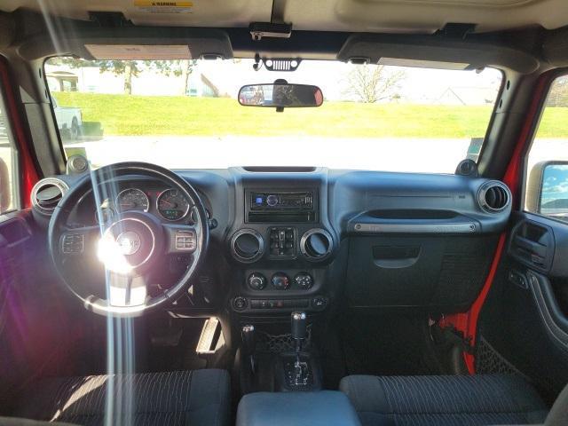 used 2012 Jeep Wrangler Unlimited car, priced at $13,652