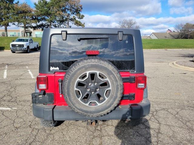 used 2012 Jeep Wrangler Unlimited car, priced at $13,652