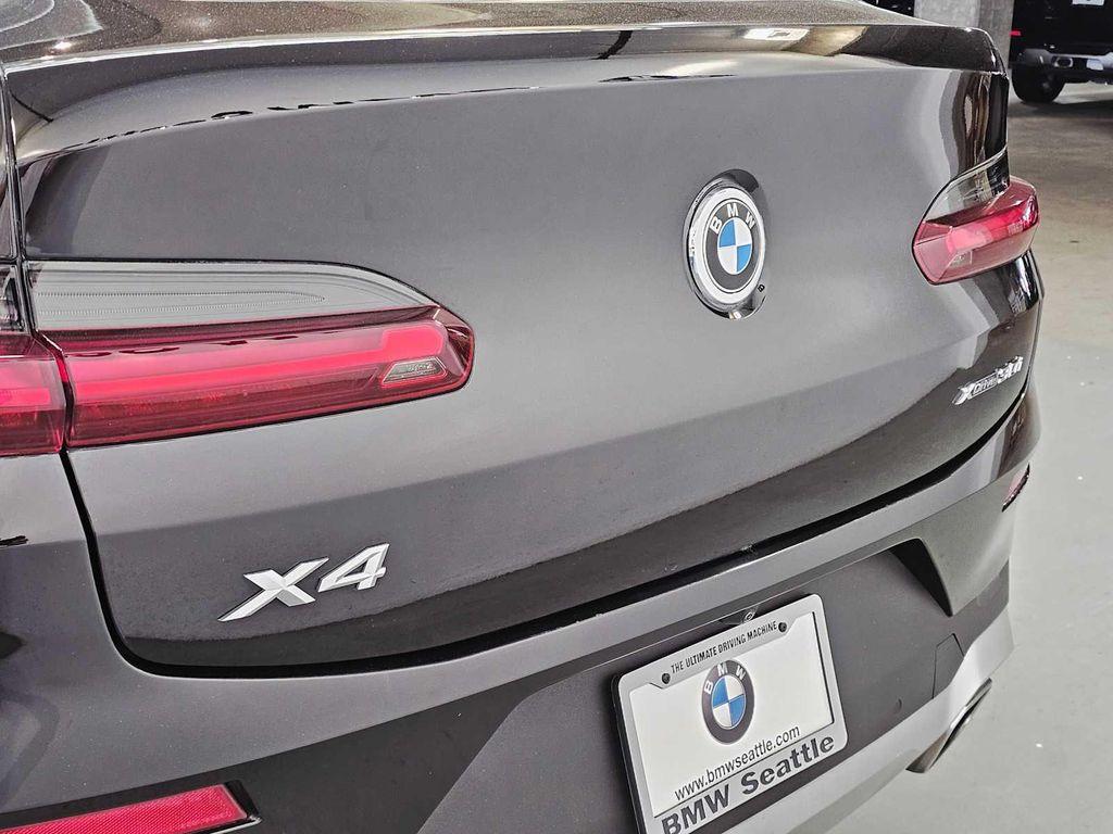 used 2022 BMW X4 car, priced at $39,999