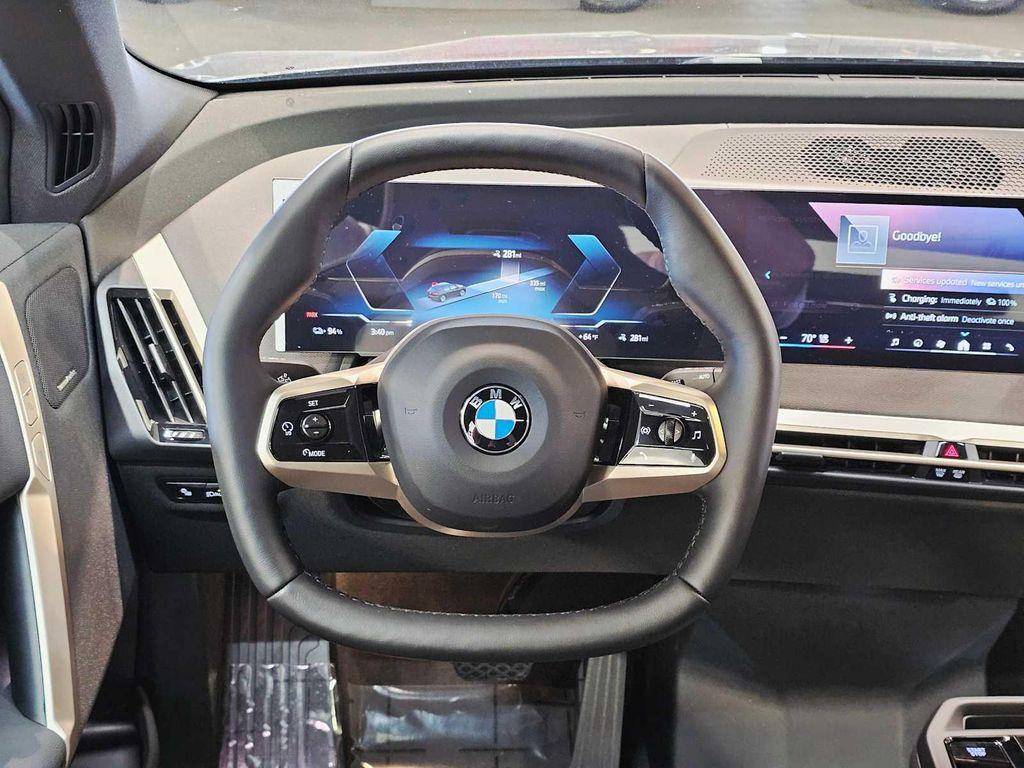 new 2026 BMW iX car, priced at $82,119