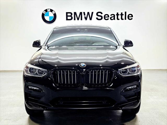 used 2021 BMW X4 car, priced at $36,999