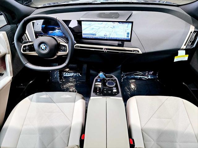 new 2025 BMW iX car, priced at $98,280