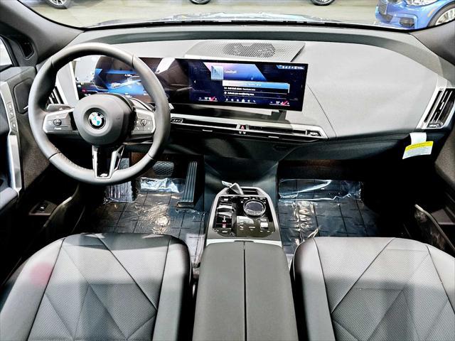 new 2025 BMW iX car, priced at $100,830