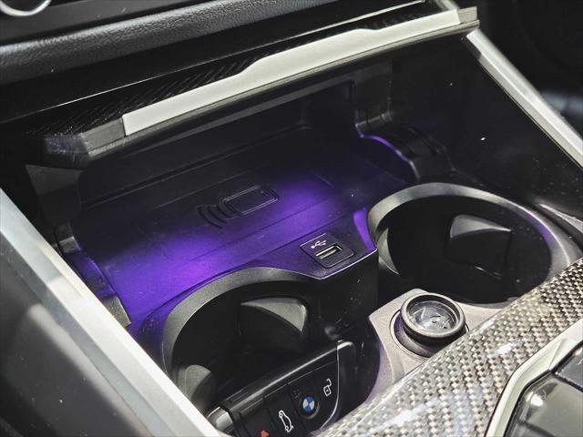 used 2023 BMW M4 car, priced at $78,999